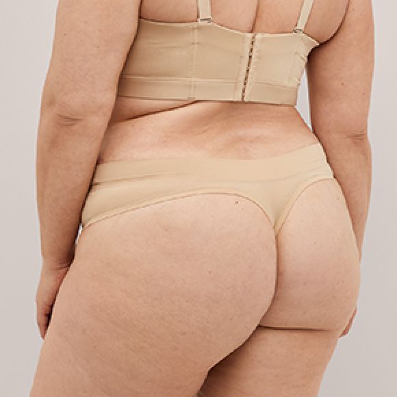 alternate Photo of model in Cacique thong panty