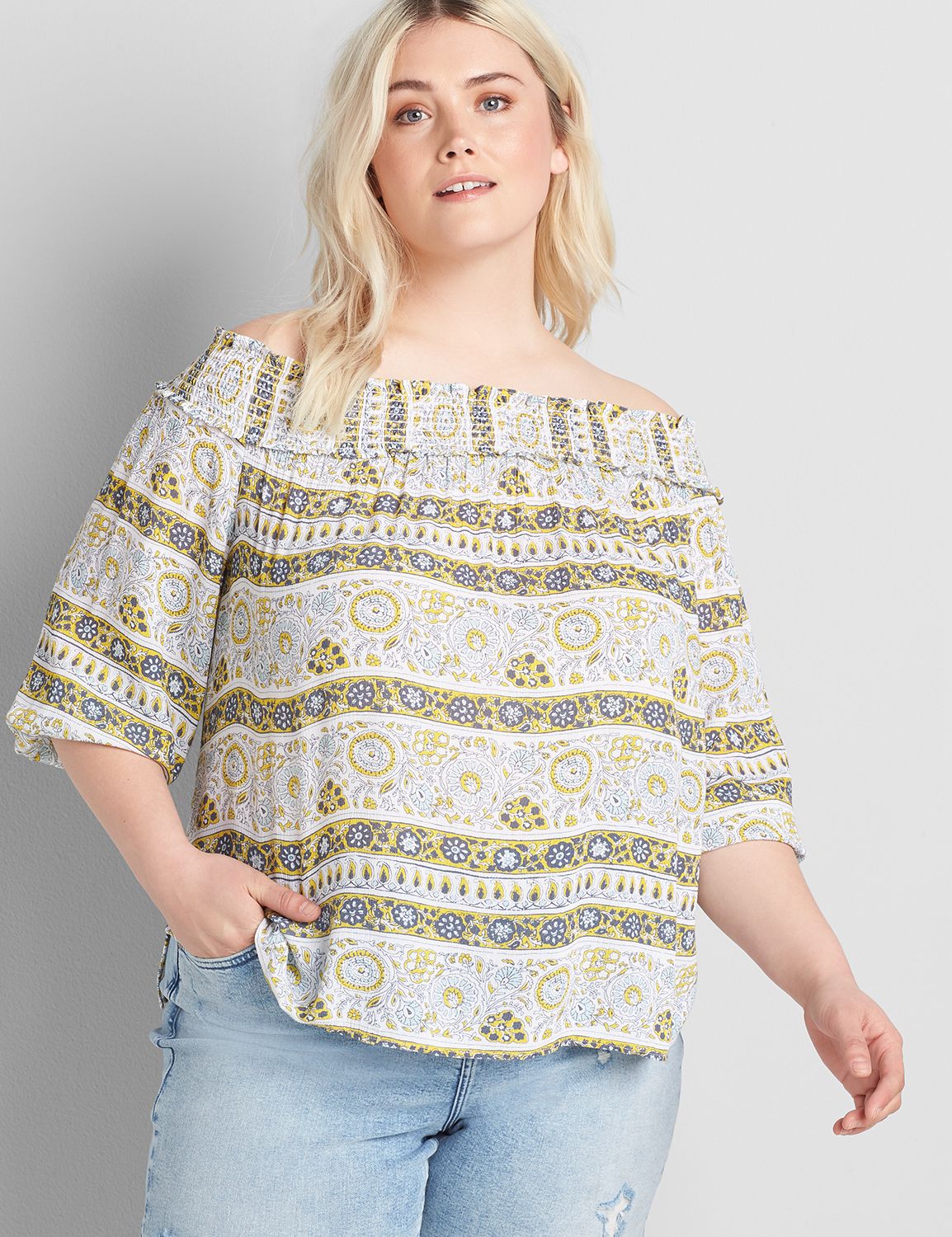 Off the shoulder neckline, three-quarter sleeves & closed back