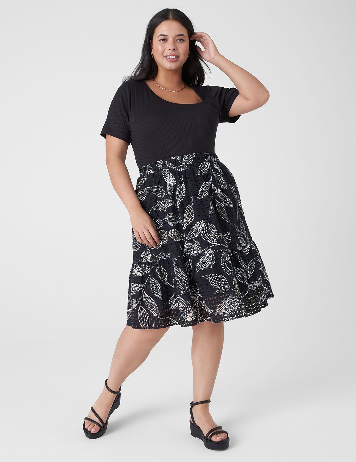 Short black eyelet outlet skirt