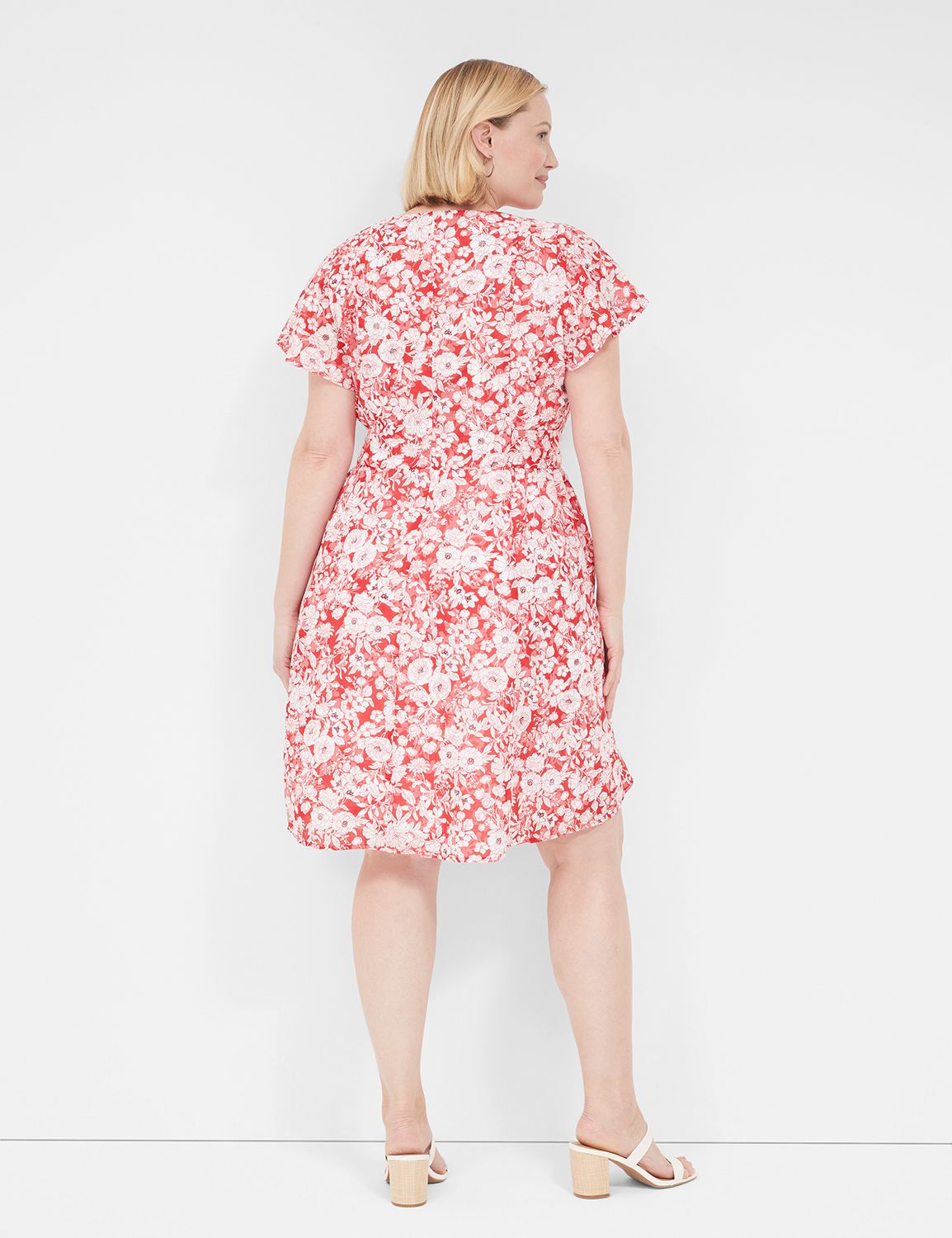 Circurar sleeve flower dress LE’RURE Short Flutter Sleeve Surplice Lena | LaneBryant